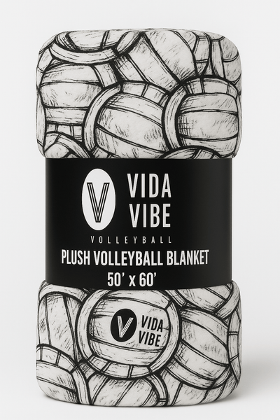 Vida Vibe plush volleyball blanket packaging with black and white design